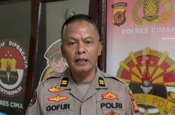 Polres Cimahi Selidiki Insiden Pelemparan Botol ke Mobil
