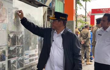 DKI Tunda Perbaikan Jalan Hingga Curah Hujan Turun