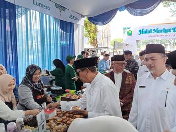  Dispangtan Salurkan Bantuan Budidaya Ikan ke Dua Ponpes 