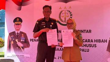 Pemkot Palu Hibahkan Gedung ke Kejari Palu