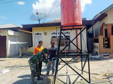 TMMD 126 Pasang Bak Air Bersih Warga Desa